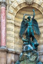 Depicting the archangel atop a demon, the bronze statue of St. Michael symbolizes the triumph of good over evil. Part of the tallest fountain in Paris, it is in Place Saint-Michel. Photo ©Wiesław Jarek/123rf.com  
