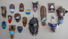 A few of my souvenir masks, now wearing masks, collected worldwide. Photos by Donna Judd