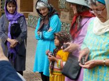 A tour member and (center) Bune Primack, wearing clothes they bought in Iran, sp