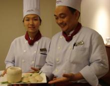 Nguyen Thu Nhi (left) and Chef Nguyen Thanh Ngoan (right) with finished Vietnamese Rice Cakes — Parkroyal Saigon. Photos by Sandra Scott