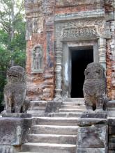 Lions guarding one of the six temples at the Preah Ko complex.