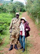 Marlene Snedaker and a ranger in Kibale National Park, Uganda. Photo by Umar Kalule (driver)