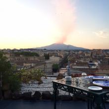 The active volcano Mt. Etna as seen from the roof terrace of the UNA Hotel Palace in Catania. Photo by Ging Steinberg