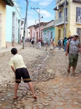 Street ball erupts with no warning in the streets of Trinidad, Cuba. Photos: Keck