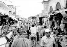 Our horse carriage takes us through the crowded streets of Granada’s markets.