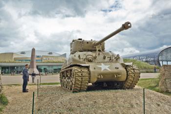 A Sherman tank guards the approach to the Utah Beach Landing Museum in Normandy, France. Photo by Dominic Arizona Bonuccelli
