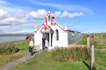 During World War II, Italian POWs housed on the Orkney Islands created a chapel from two army huts, decorating it with a Neo-Baroque facade. Photo by Rick Steves