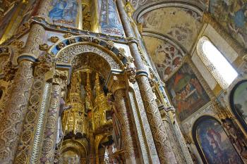 The church inside Tomar's Convento de Cristo, designed at the height of Portugal's sea power, is covered with elaborate motifs. Photo by Rick Steves