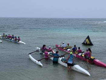 Outrigger canoe races out of Avarua, the main town on Rarotonga.