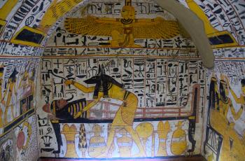 This painting inside a worker’s tomb shows Anubis, the jackal-headed god of the underworld, performing the Opening of the Mouth ceremony to help the deceased move on to the afterlife.