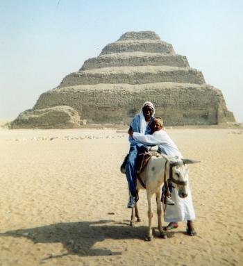 Frank Stewart on a donkey at the Step Pyramid of Djoser.