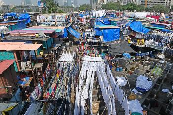 In Mumbai, laundry is done at Dhobi Ghat. Photo by John Hicks