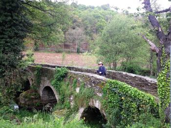 Don Horel standing on Ponte Áspera, a Roman bridge on the Camino de Santiago, just outside Sarria, Spain.