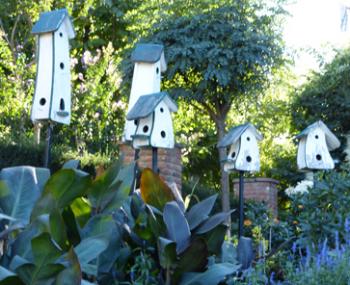 Zura Shev­ardnadze, the owner of Gardenia in Tbilisi, Georgia. Photo by Yvonne Michie HornPlayfully constructed birdhouses along a Gardenia path.