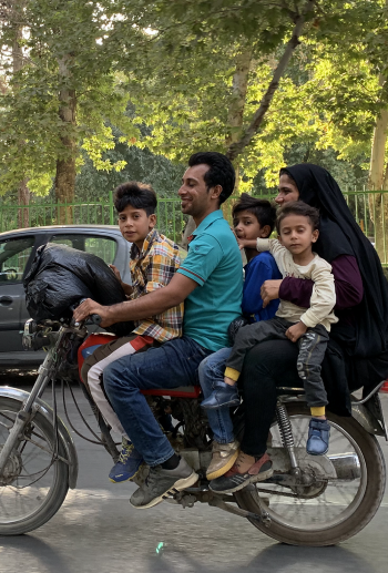 A family of five on a single motorbike.