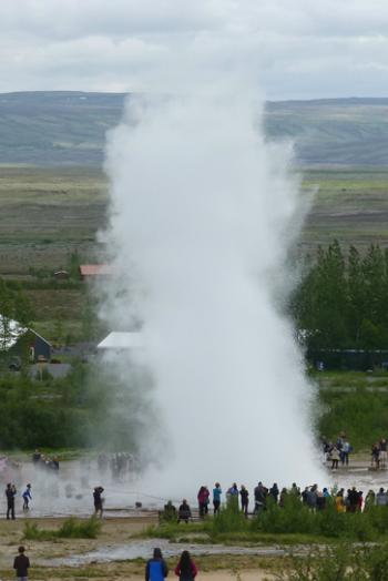 The geyser Strokkur bellows and steams at regular intervals — southwestern Iceland.