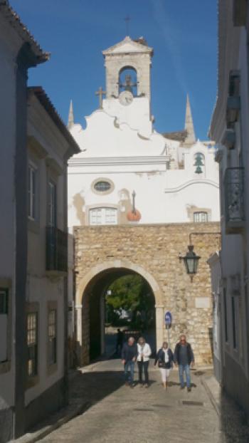 Looking at the Arco da Vila, a neoclassical gateway, from within Faro's Old Town. Photo by Randy Keck