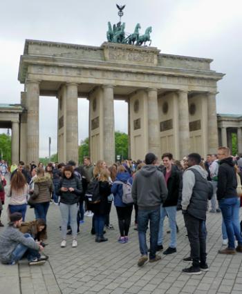 Students visiting Berlin’s historic Brandenburg Gate.