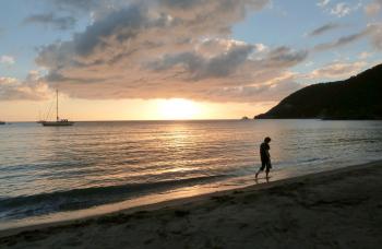 Sunset at Purple Turtle Beach, one of the few sand beaches on Dominica.