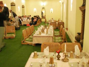 Dining room, with low chairs, in the restaurant Bhojan Griha in Kathmandu, Nepal.