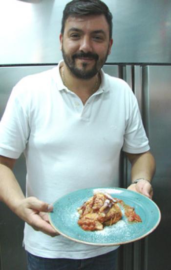 Chef Giovanni Ciaravola with the finished dish.