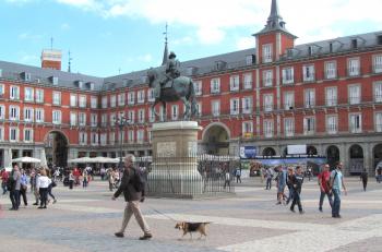 The Plaza Mayor in Madrid. (Pictured in the left-hand corner, our rental apartment was on a lower floor and had a long balcony.)