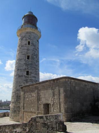 The lighthouse at Castillo de los Tres Reyes del Morro (El Morro) — Havana, Cuba.