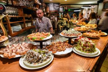 At Basque-style tapas bars, pintxos are already laid out, so you can simply point to or grab what you want. Photos by Cameron Hewitt
