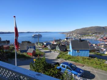 The views from the town of Qaqortog, Greenland, are quite scenic. The <i>Viking Sea</i> can be seen docked in the small harbor.