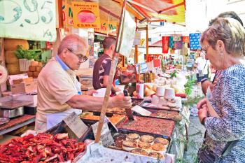 Take a walk through Palermo's Ballarò Market to assemble a delectable moveable feast. Photo by Dominic Arizona Bonuccelli