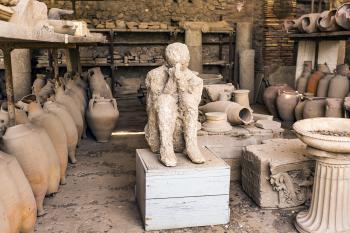 Pompeii's most compelling scenes are its (permanent) residents, whose plaster-cast remains are amazingly detailed, revealing clothing features and facial expressions. <i>(Addie Mannan/Rick Steves’ Europe/TNS)</i>