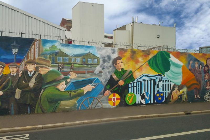 Explore the sectarian neighborhoods of Belfast with a local guide who can offer insights and commentary on the area’s political murals. Photo by Jessica Shaw