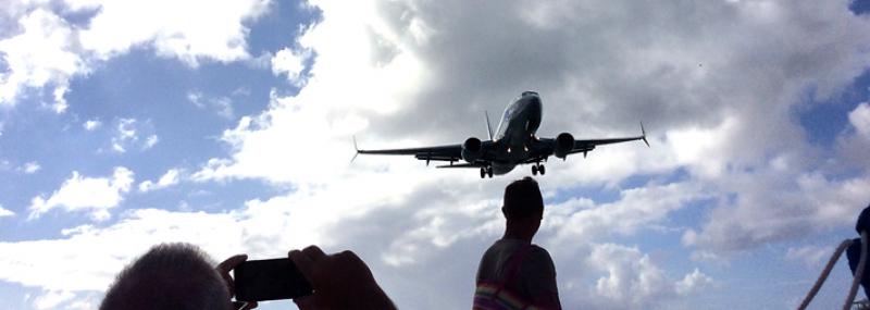 Planes are so close, you can almost get a free flight just by grabbing the tail — Sint Maarten.  Photos by Miyako Storch