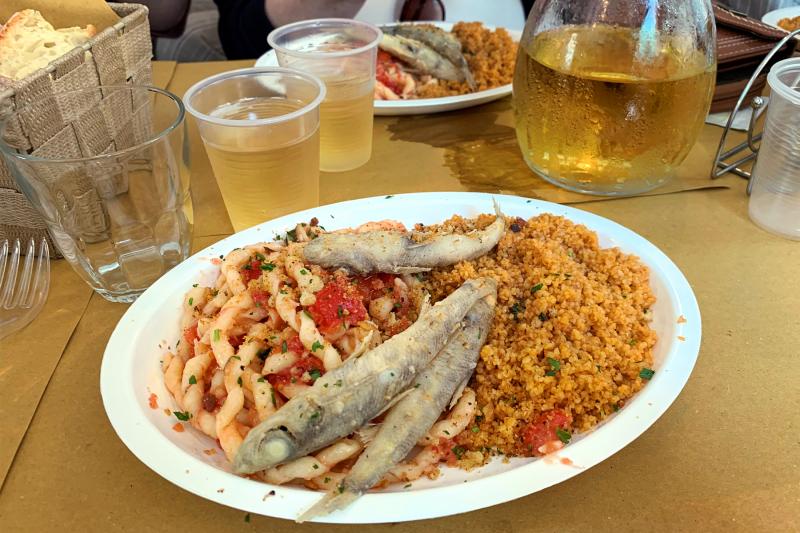 Even on the small island of Sicily, you'll find regional specialties, such as fish couscous and Busiate alla Trapanese, a twisty pasta with red pesto. Photo by Carrie Shepherd